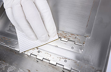 white wipe cleaning surface